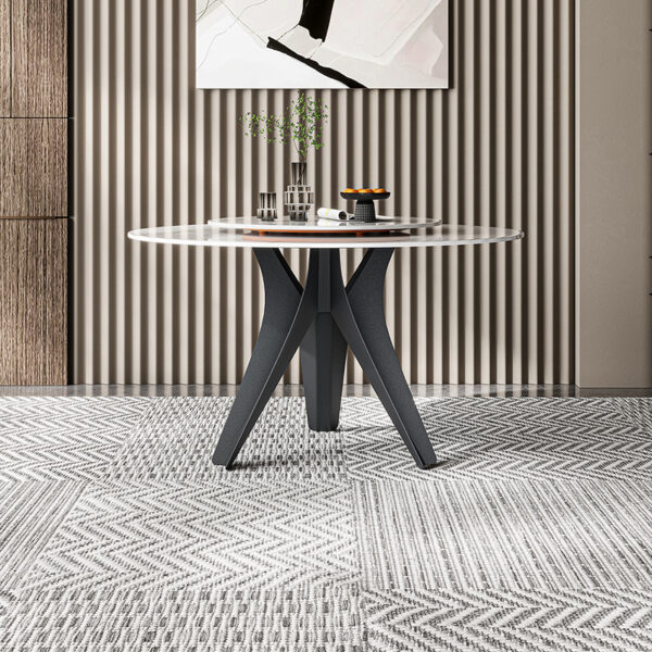 Forked legs and round marble dining table are modern and simple